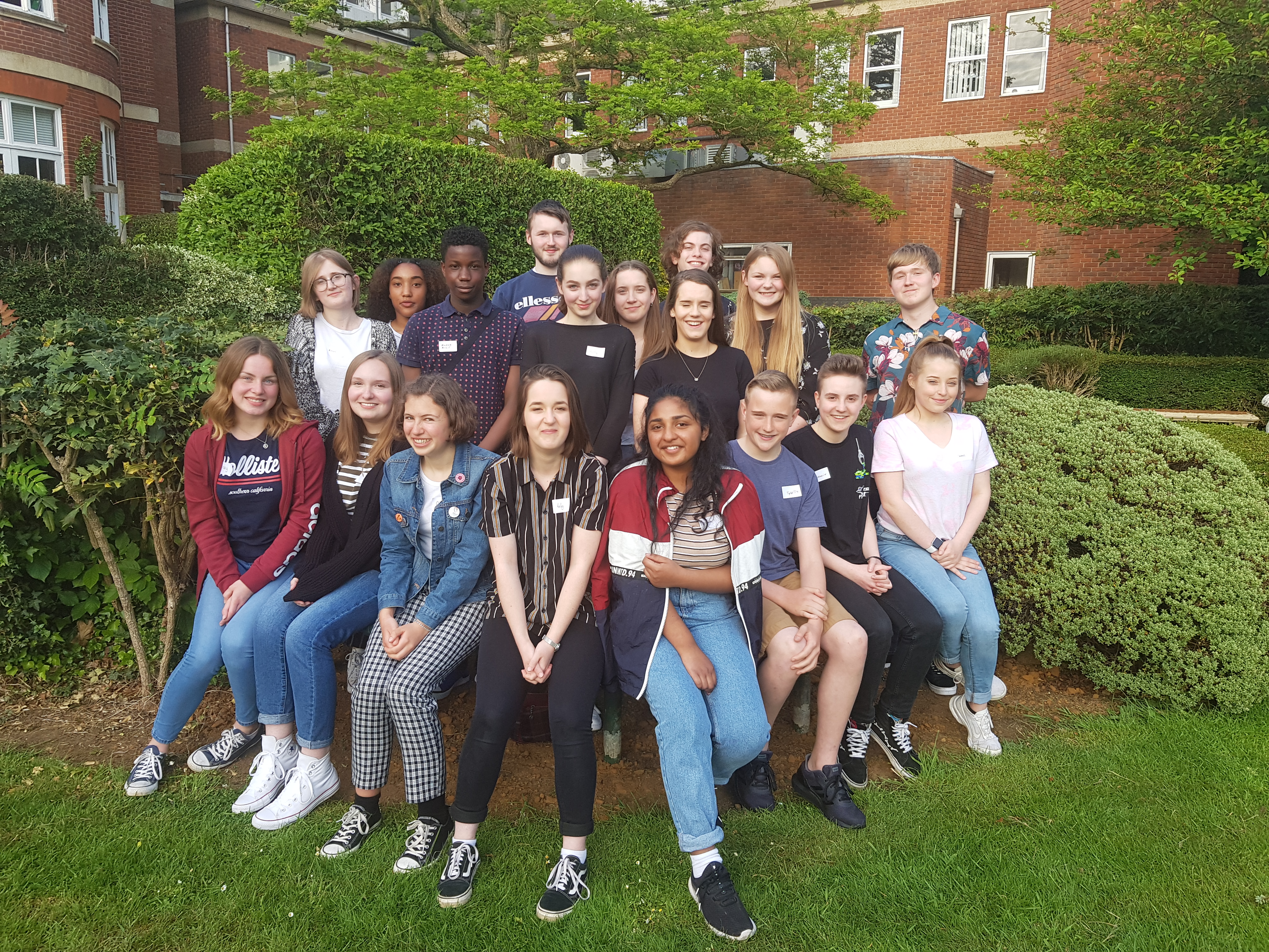 This is a picture of the young people who make up the Youth Commission. They are sitting in the garden at Wootton Hall when they held their first meeting